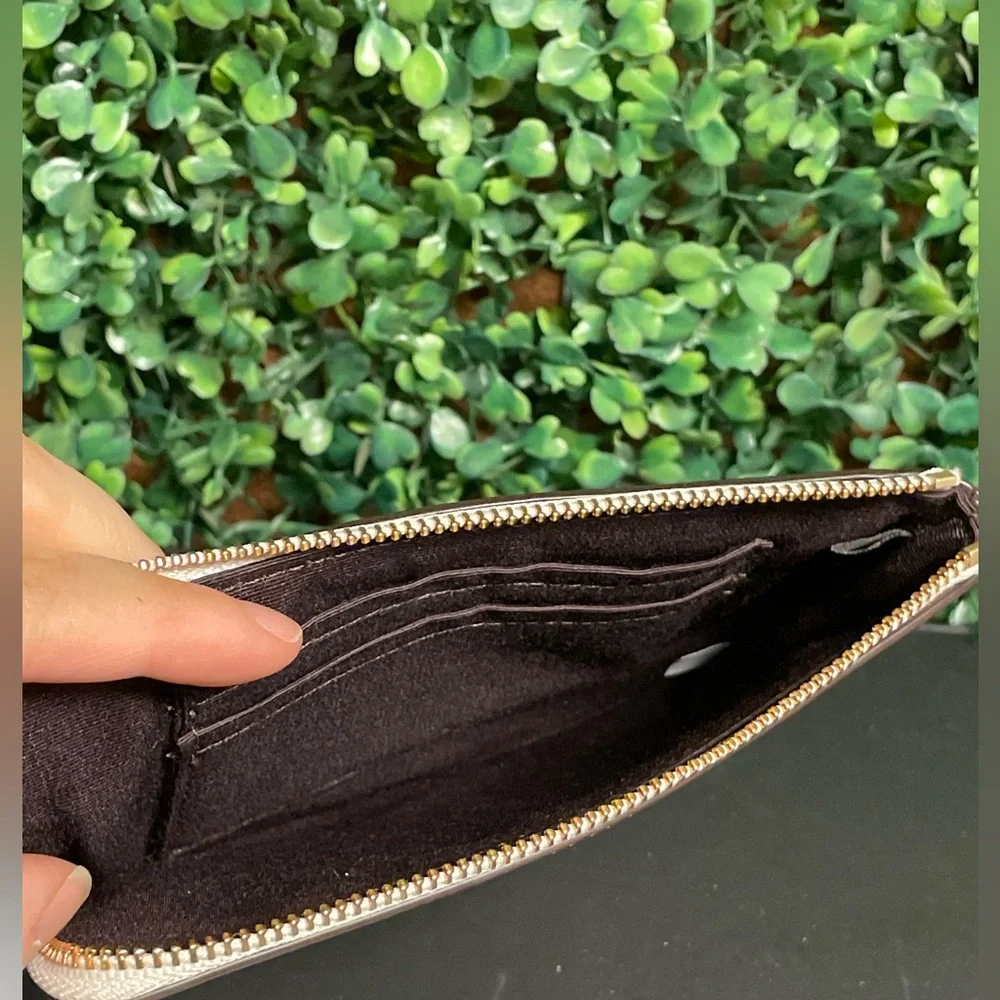 Coach - Small Corner Zip Wristlet in chalk crossgrain leather